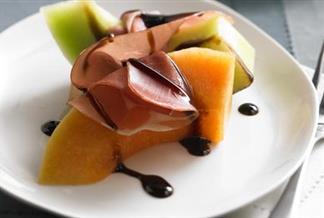 Melon and Prosciutto with Ruby Cranberry Drizzle
